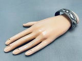 Hand Tooled Vintage Native American Navajo Repoussed Sterling Silver Bracelet-Nativo Arts