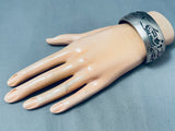 Detailed Hand-carved Vintage Navajo Sterling Silver Kachina Dancer Bracelet