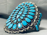 Signed Towering Vintage Native American Navajo Turquoise Sterling Silver Repoussed Bracelet-Nativo Arts