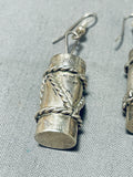 Noteworthy Native American Navajo Handcarved Sterling Silver Drums Earrings-Nativo Arts