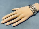 Noteworthy Native American Navajo Handcarved Sterling Silver Triple Rail Bracelet-Nativo Arts