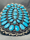 Signed Towering Vintage Native American Navajo Turquoise Sterling Silver Repoussed Bracelet-Nativo Arts