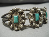 Opulent Early 1900's Vintage Native American Navajo Green Turquoise Coin Coin Silver Bracelet-Nativo Arts