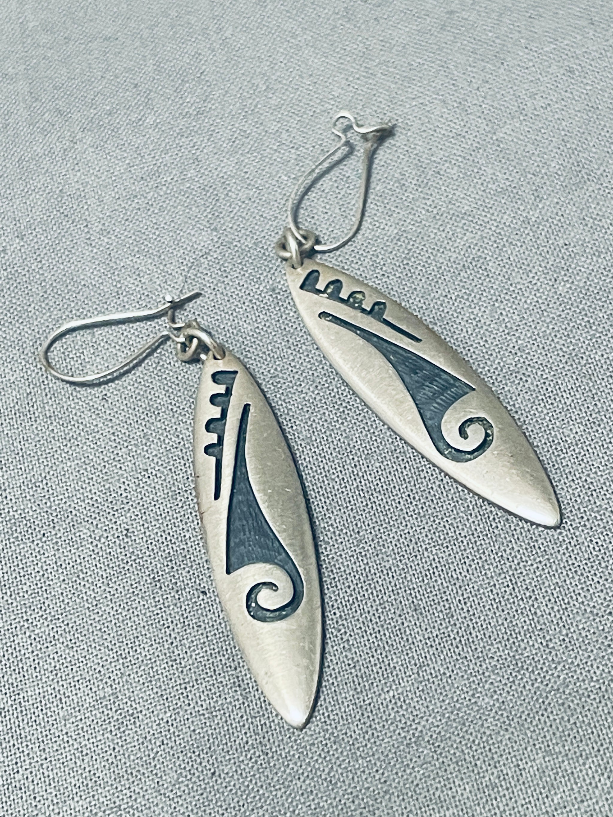 Gerald selling L. Native American Hopi earrings