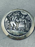Fascinating Vintage Native American Navajo Sterling Silver Storyteller Round Earrings-Nativo Arts