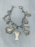 Detailed Important Vintage Native American Navajo Charm Sterling Silver Bracelet-Nativo Arts