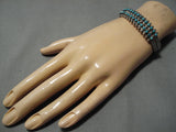 Striking Vintage Navajo Turquoise Row Sterling Silver Native American Bracelet-Nativo Arts