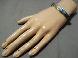 Symbolic Vintage Native American Navajo Gold Yei Blue Warrior Turquoise Sterling Silver Bracelet-Nativo Arts