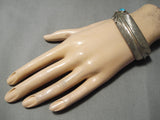 Striking Vintage Native American Navajo Hand Carved Sterling Silver Feather Bracelet Old-Nativo Arts