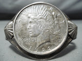 Striking Vintage Navajo Native American Sterling Silver Peace Dollar Bracelet-Nativo Arts