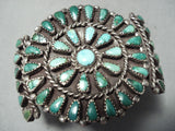 Opulent Vintage Native American Navajo Cerrillos Turquoise Sun Sterling Silver Bracelet Old-Nativo Arts