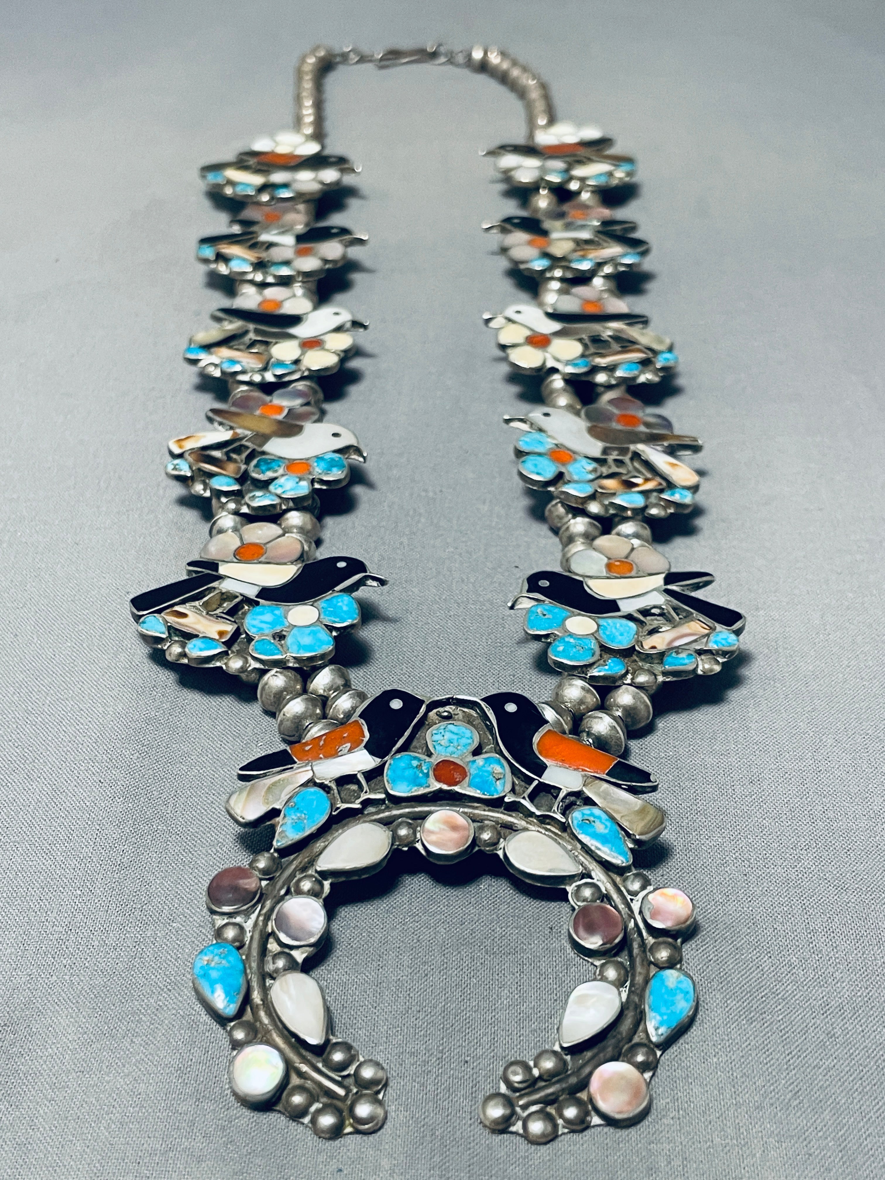 Zuni Style Squash Blossom Necklace Sunface Chief Squash Blossom - Enameled Mother-Of-Pearl, Onyx, Tortoise Shell, Turquoise and Coral