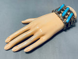 Heavy Coiled Coin Vintage Native American Navajo Turquoise Sterling Silver Bracelet Old-Nativo Arts