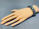 Silverwork Genius Vintage Native American Navajo Turquoise Sterling Silver Repoussed Bracelet-Nativo Arts