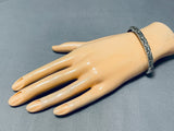 Al Toadacheene Vintage Native American Navajo Sterling Silver Sun Stamp Bracelet-Nativo Arts
