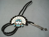 Detailed Vintage Native American Zuni Inlay Turquoise Coral Sunface Headdress Bolo-Nativo Arts
