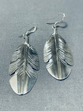 Intricately Hand Carved Vintage Native American Navajo Sterling Silver Feather Earrings-Nativo Arts