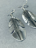 Intricately Hand Carved Vintage Native American Navajo Sterling Silver Feather Earrings-Nativo Arts