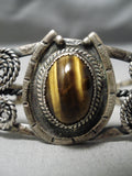Rare Early Vintage Native American Navajo Swirling Sterling Silver Tiger's Eye Bracelet-Nativo Arts