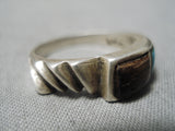 Superior Vintage Native American Navajo Turquoise And Ironwood Sterling Silver Ring Old-Nativo Arts