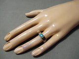 Superior Vintage Native American Navajo Turquoise And Ironwood Sterling Silver Ring Old-Nativo Arts