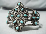 Superior Vintage Native American Navajo Turquoise Flower Sterling Silver Bracelet-Nativo Arts