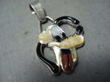 Whimsical Native American Zuni Coral Mother Of Pearl Jet Inlay Sterling Silver Pluto Pendant-Nativo Arts