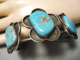 Superior Vintage Native American Navajo #8 Turquoise Sterling Silver Flower Bracelet Old-Nativo Arts