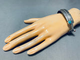 Signed Intricately Hand Carved Vintage Native American Navajo Sterling Silver Bracelet-Nativo Arts