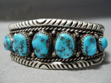 Intense Wave Vintage Native American Navajo Graduating Turquoise Sterling Silver Bracelet Old-Nativo Arts