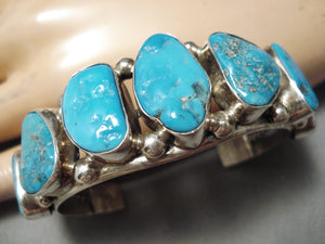 Superior Vintage Native American Navajo Graduating Turquoise Sterling Silver Bracelet Old-Nativo Arts