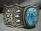 Eye Catching Navajo Optimal Spiderweb Turquoise Repoussed Native American Jewelry Silver Bracelet-Nativo Arts