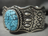 Eye Catching Navajo Optimal Spiderweb Turquoise Repoussed Native American Jewelry Silver Bracelet-Nativo Arts