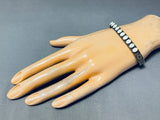 Marvelous Vintage Native American Zuni Synth Opals Sterling Silver Harlan Coonsis Bracelet-Nativo Arts