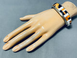 Mesmerizing Signed Native American Navajo Inlay Orange Spiny Black Onyx Sterling Silver Bracelet-Nativo Arts