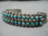 Striking Vintage Navajo Turquoise Row Sterling Silver Native American Bracelet-Nativo Arts