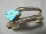 Superior Vintage Native American Navajo Graduating Turquoise Sterling Silver Bracelet Old-Nativo Arts