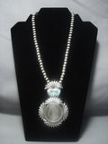 Striking Vintage Navajo Native American Jewelry jewelry Sterling Silver Dollar Sterling Silver Necklace-Nativo Arts